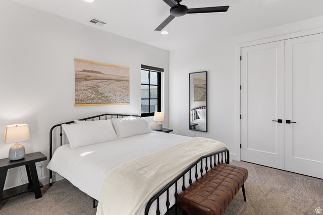 5367 Cyan Lane St. George, UT 84790 - Photo 7 of 49 Neutral interior featuring a matte black ceiling fan, recessed lighting, and a window with black trim