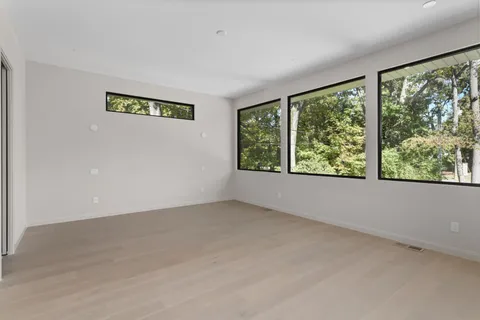 an empty room with windows