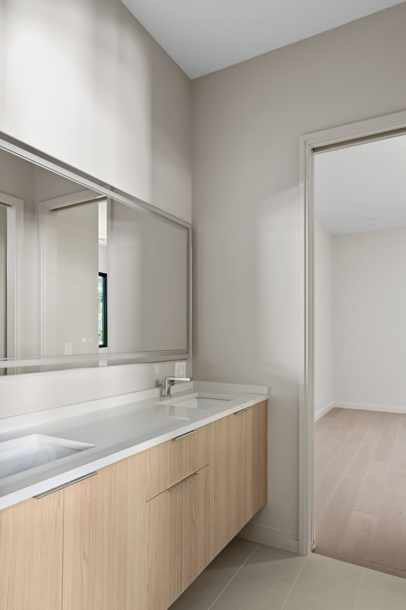 3707 A Woodmont Boulevard Nashville, TN 37215 - Photo 42 of 56 a bathroom with a double vanity sink and mirror