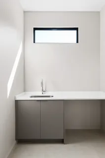 a kitchen with a stove and a refrigerator