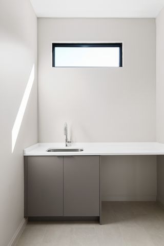 a kitchen with a stove and a refrigerator