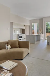 a living room with furniture and window