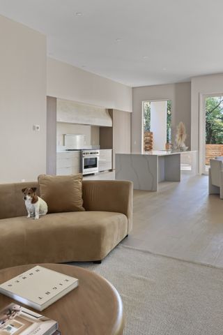 a living room with furniture and window