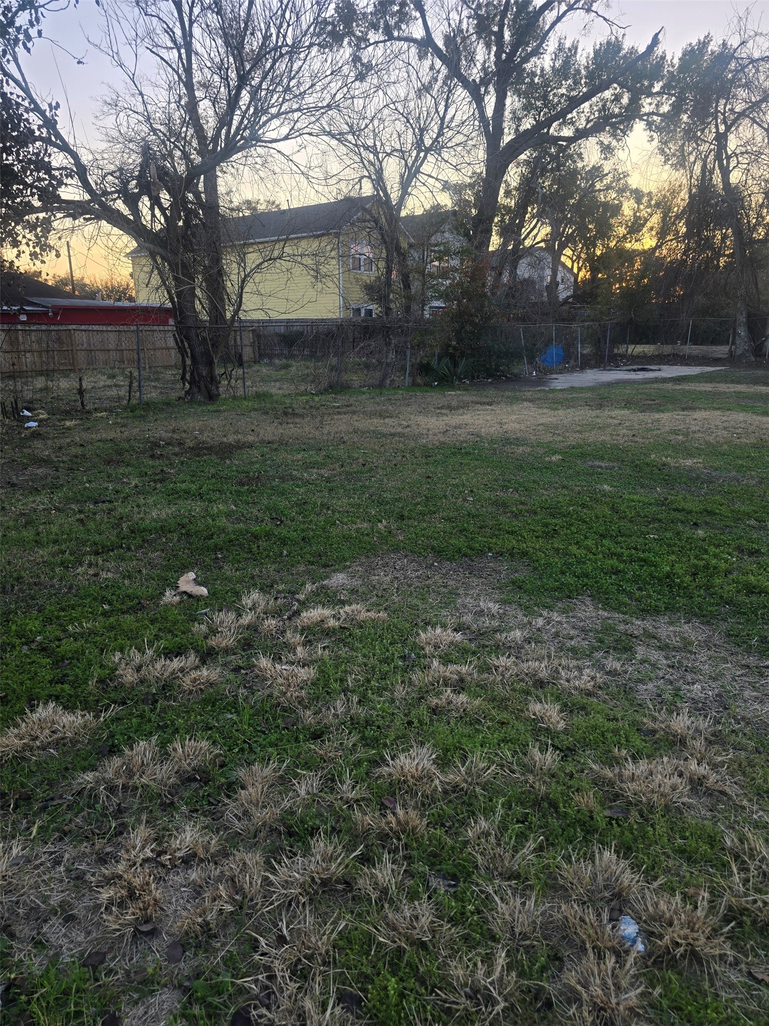 4615 Fulton Street Houston, TX 77009 - Photo 4 of 7 a view of outdoor space with green field and trees