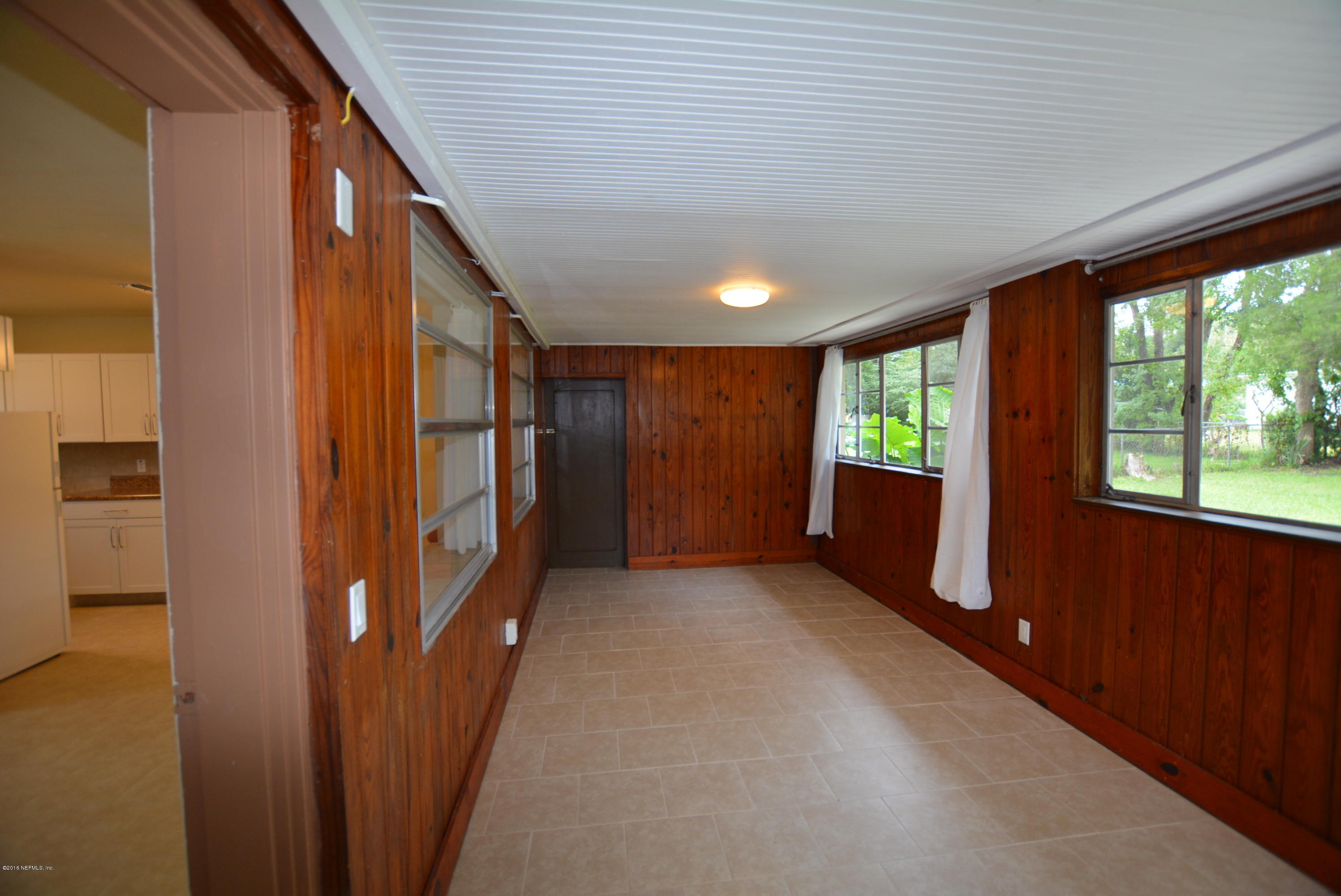 2963 Alonso Road Jacksonville, FL 32216 - Photo 20 of 22 Layout of florida room and kitchen