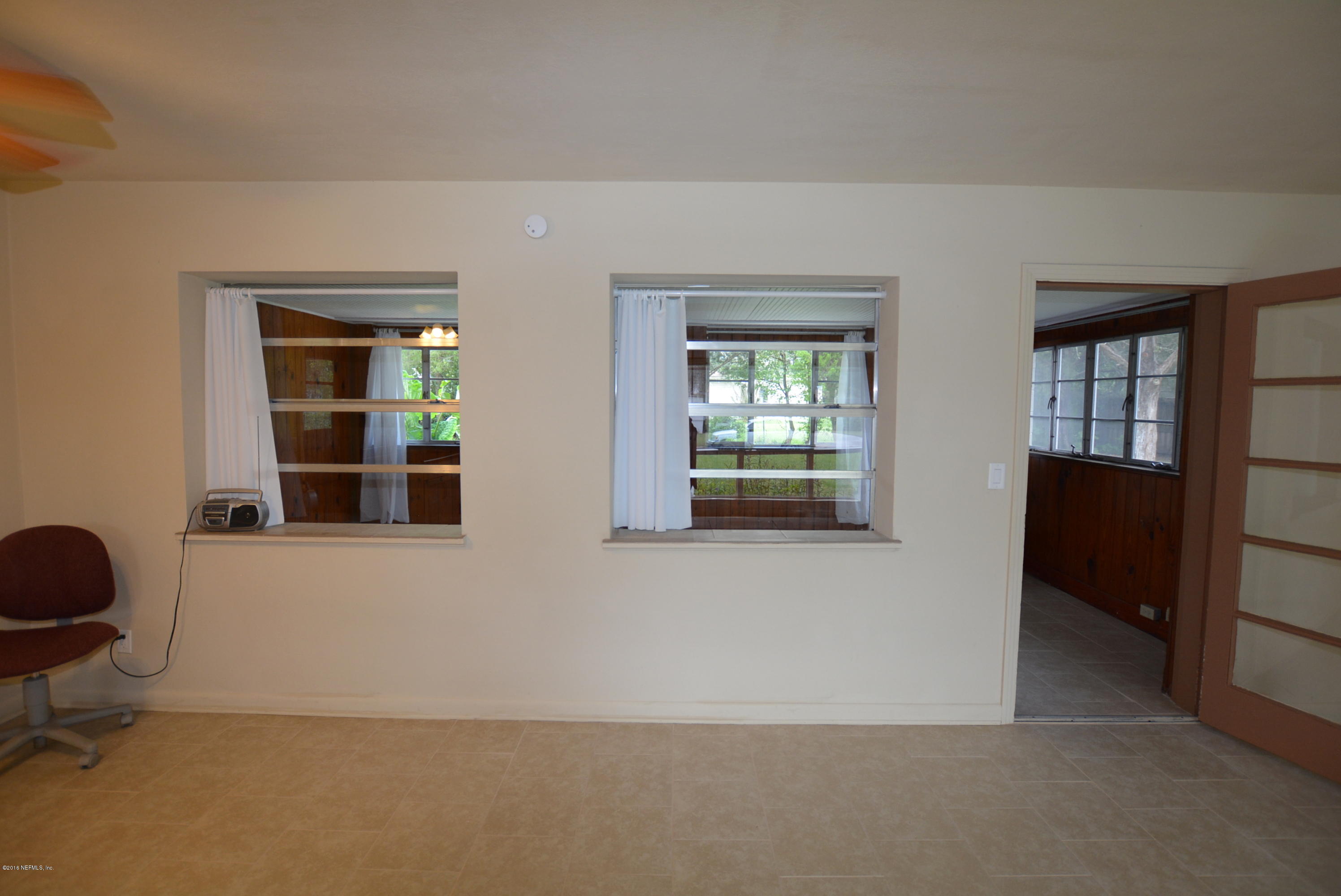 2963 Alonso Road Jacksonville, FL 32216 - Photo 6 of 22 View from family room to porch