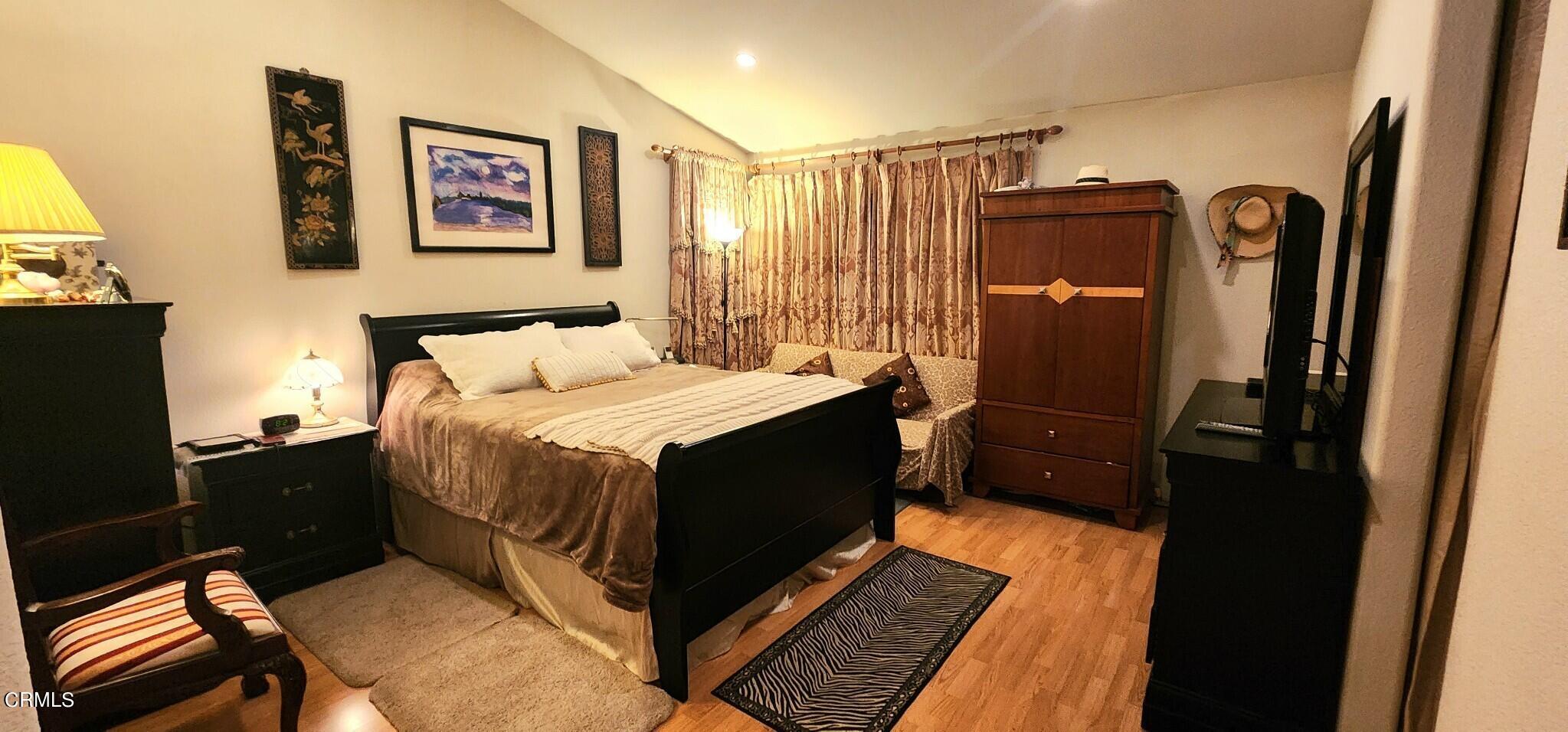 1500 Gabriella Drive Oxnard, CA 93030 - Photo 12 of 23 a bedroom with a bed and a dresser