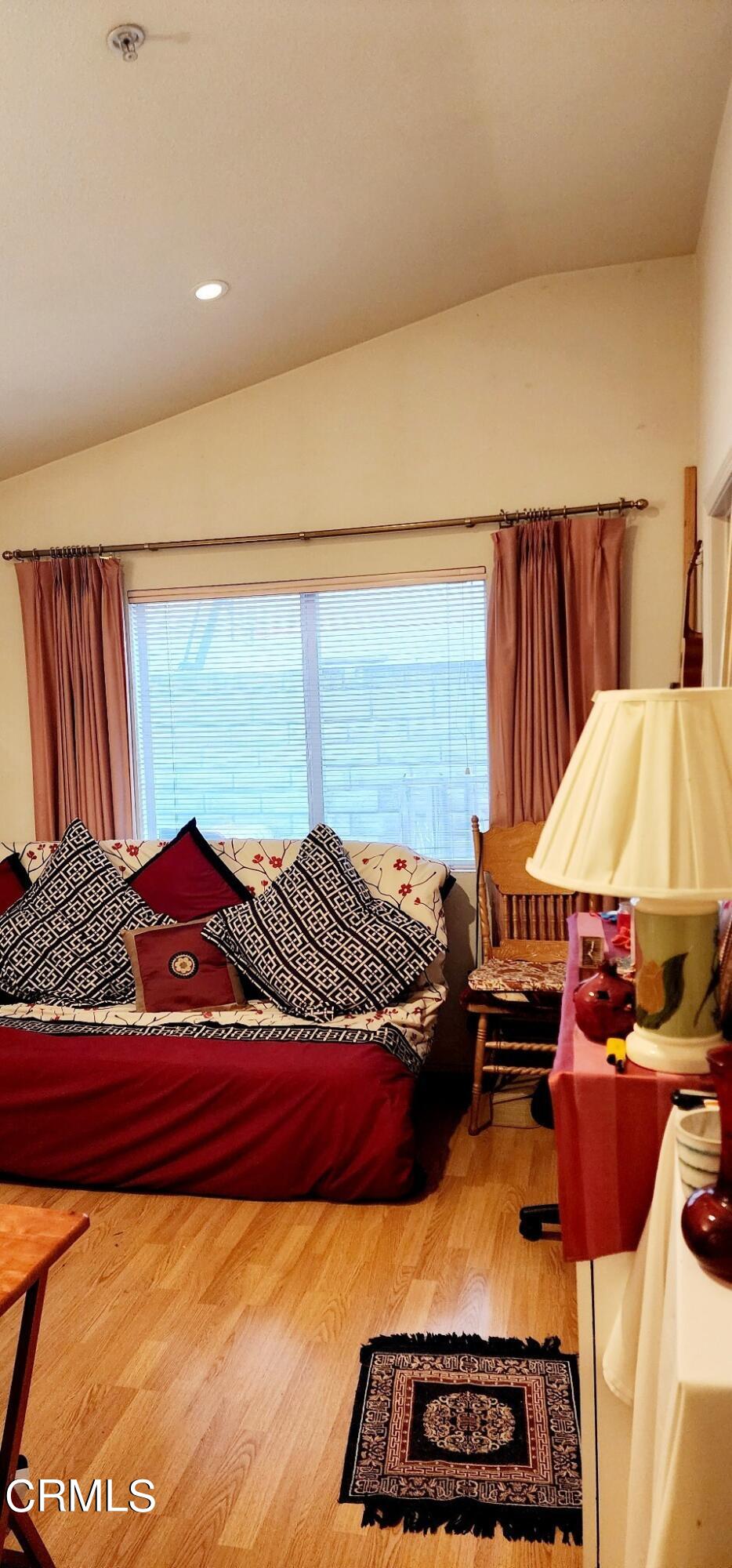 1500 Gabriella Drive Oxnard, CA 93030 - Photo 17 of 23 a bedroom with a bed and lamp