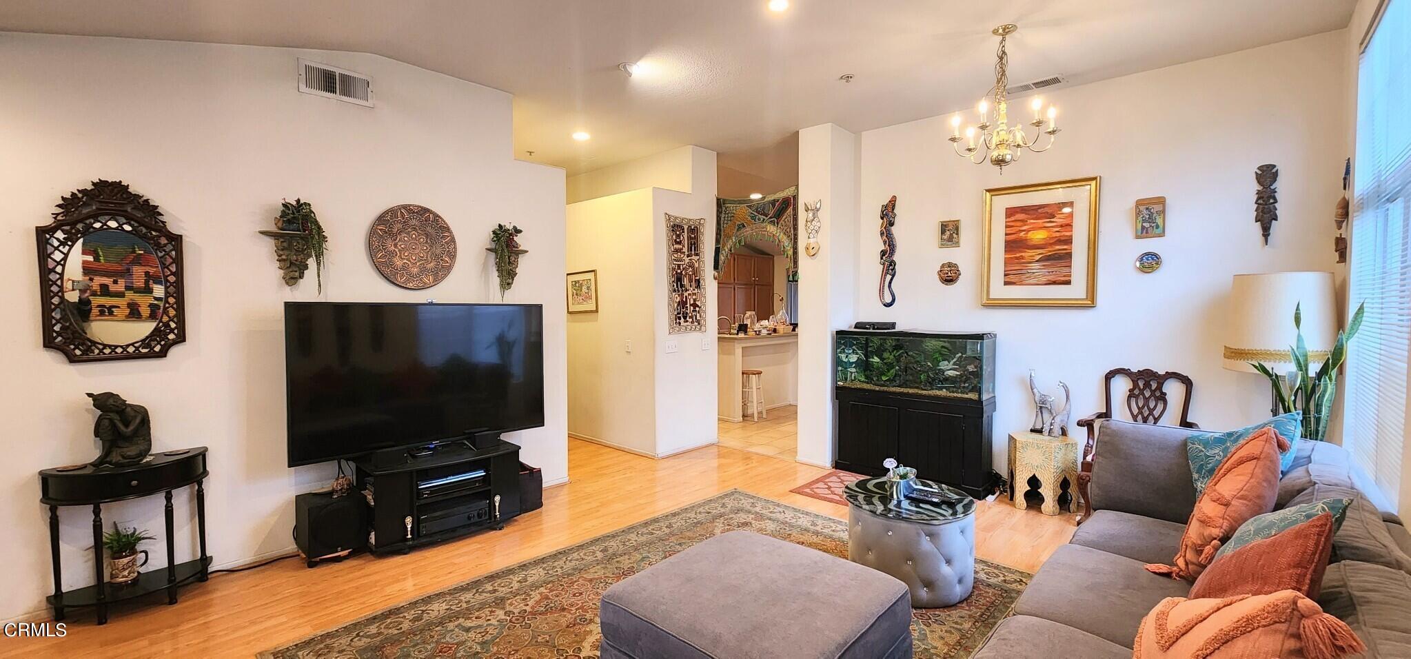1500 Gabriella Drive Oxnard, CA 93030 - Photo 4 of 23 a living room with furniture and a flat screen tv