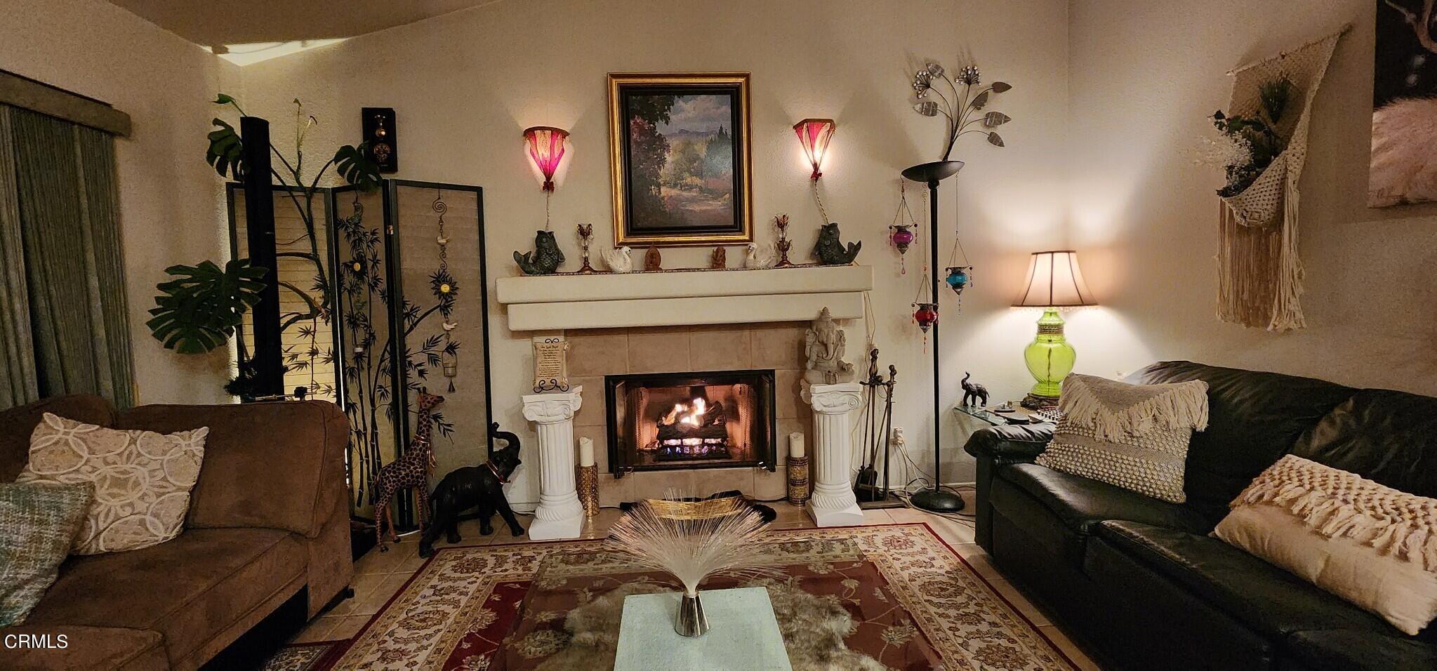 1500 Gabriella Drive Oxnard, CA 93030 - Photo 7 of 23 a living room with furniture and a fireplace