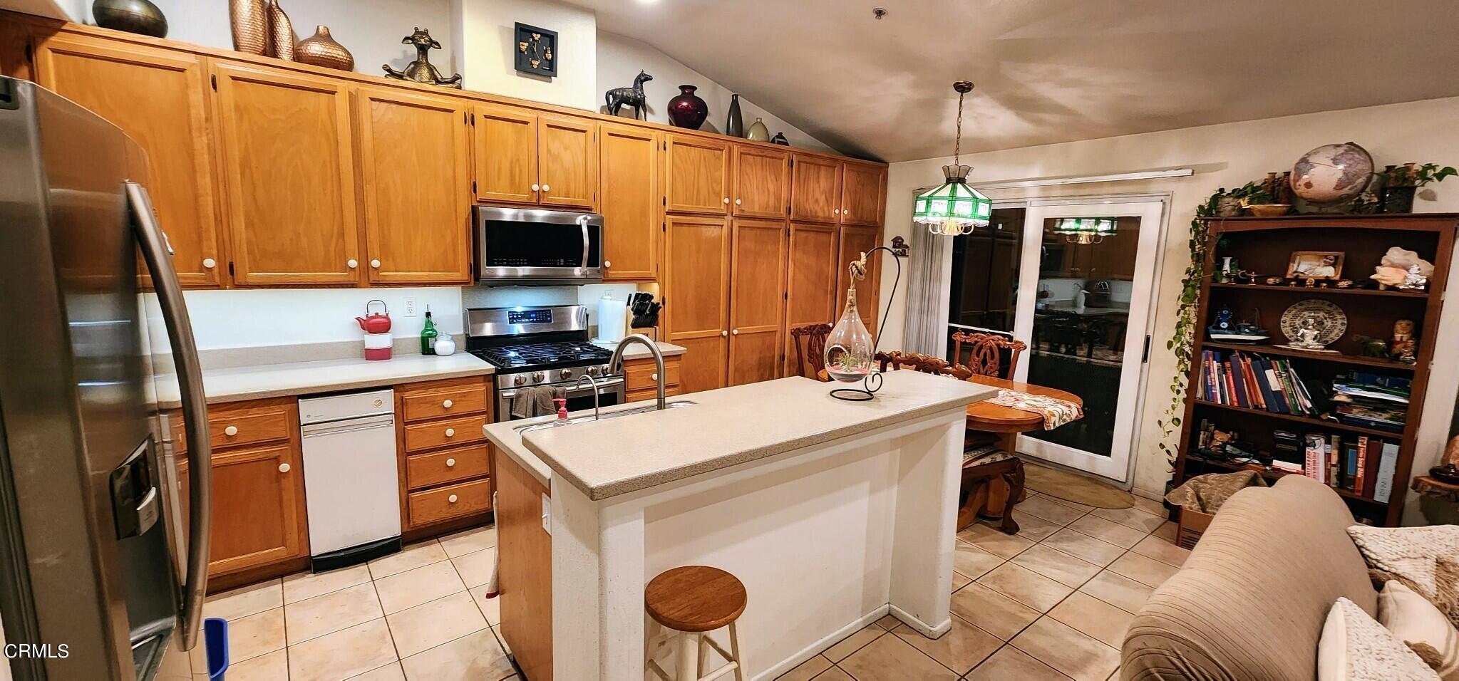 1500 Gabriella Drive Oxnard, CA 93030 - Photo 9 of 23 a kitchen that has a sink and a stove in it