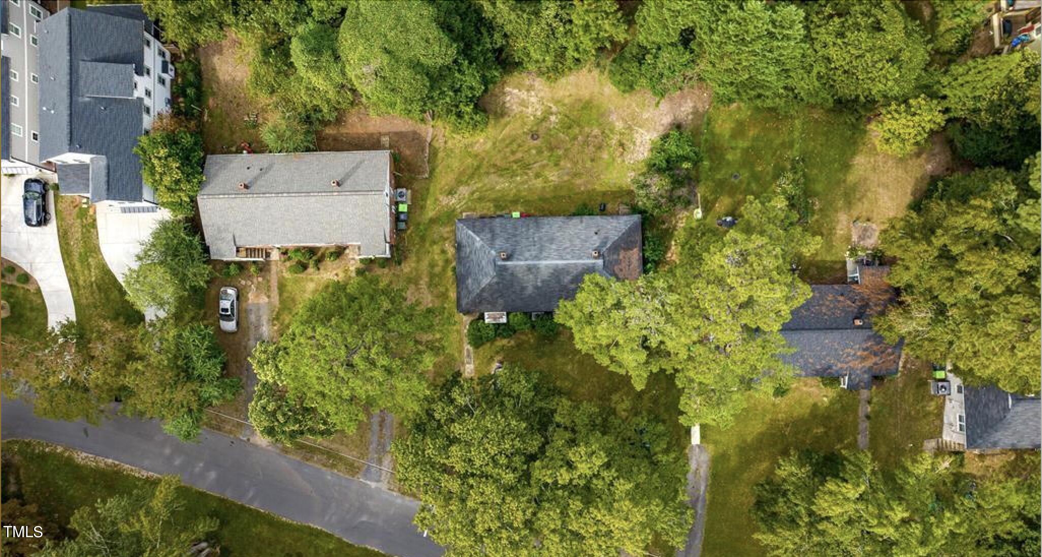 1309-1311 Nottingham Road Raleigh, NC 27607 - Photo 2 of 3 an aerial view of a house with a yard