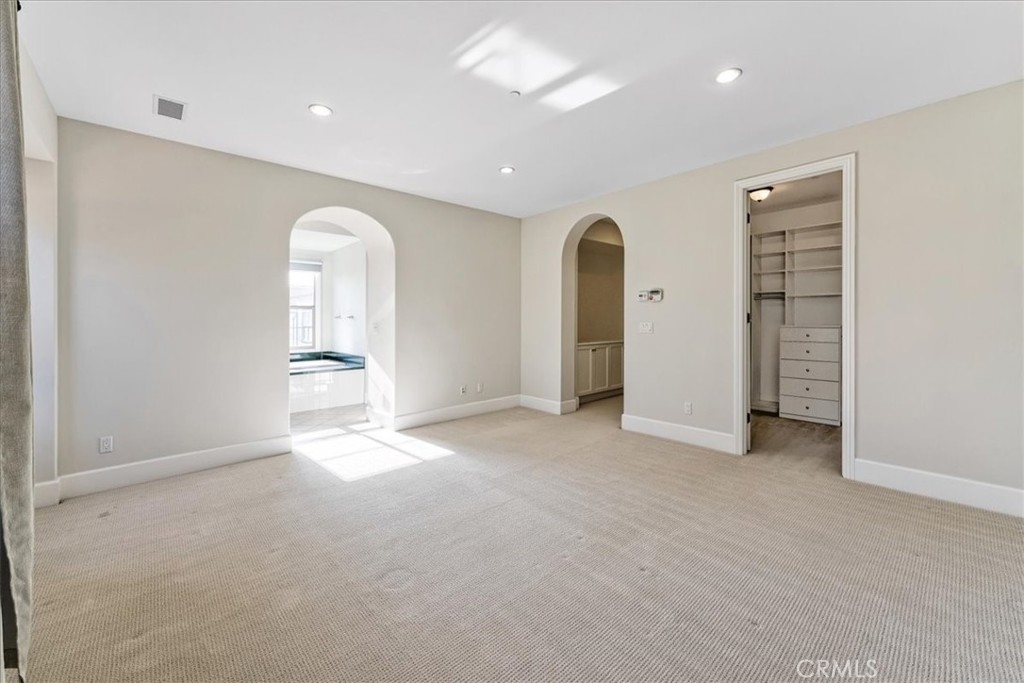 72 Clifford Irvine, CA 92618 - Photo 40 of 65 an empty room with closet and windows