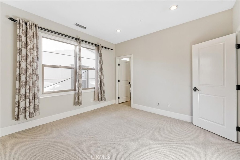 72 Clifford Irvine, CA 92618 - Photo 48 of 65 a view of an empty room with a window