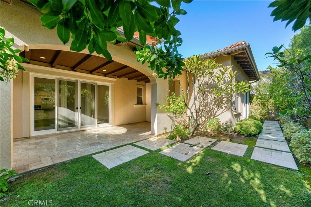 72 Clifford Irvine, CA 92618 - Photo 63 of 65 a front view of a house with a yard