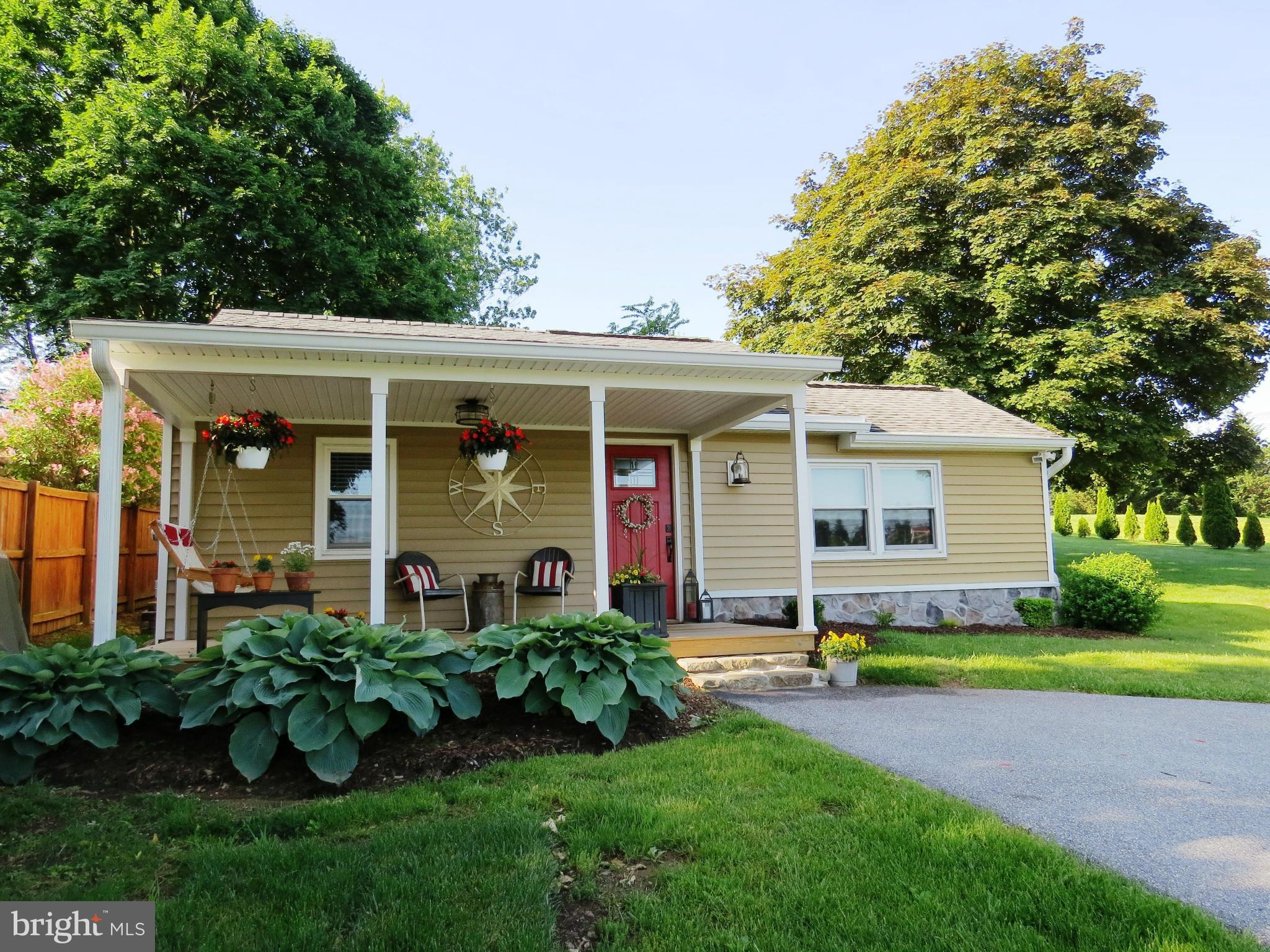3313 Maple Grove Road Hampstead, MD 21074 - Photo 1 of 30 a front view of house with yard and green space