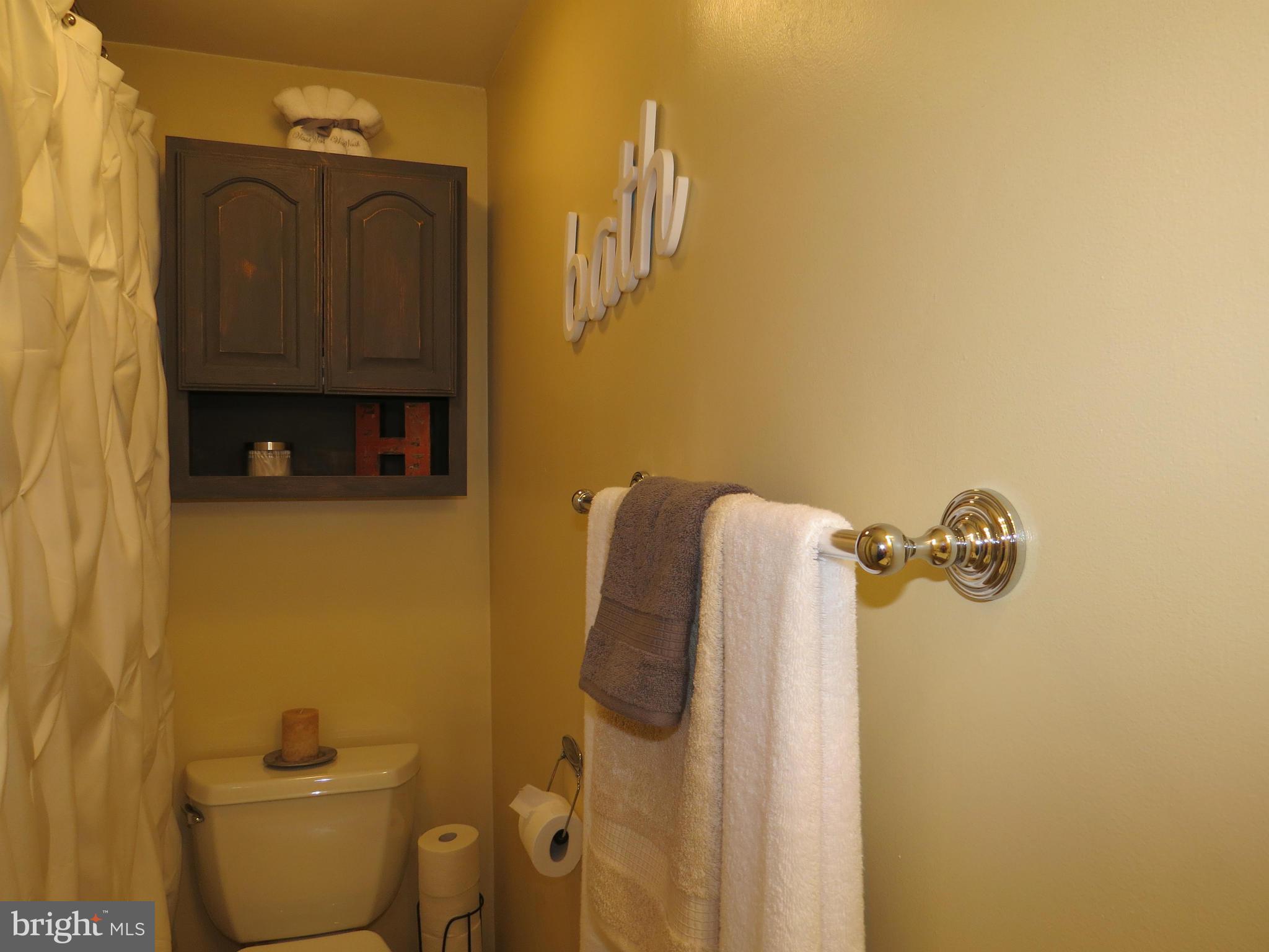 3313 Maple Grove Road Hampstead, MD 21074 - Photo 16 of 30 a bathroom with a sink and toilet