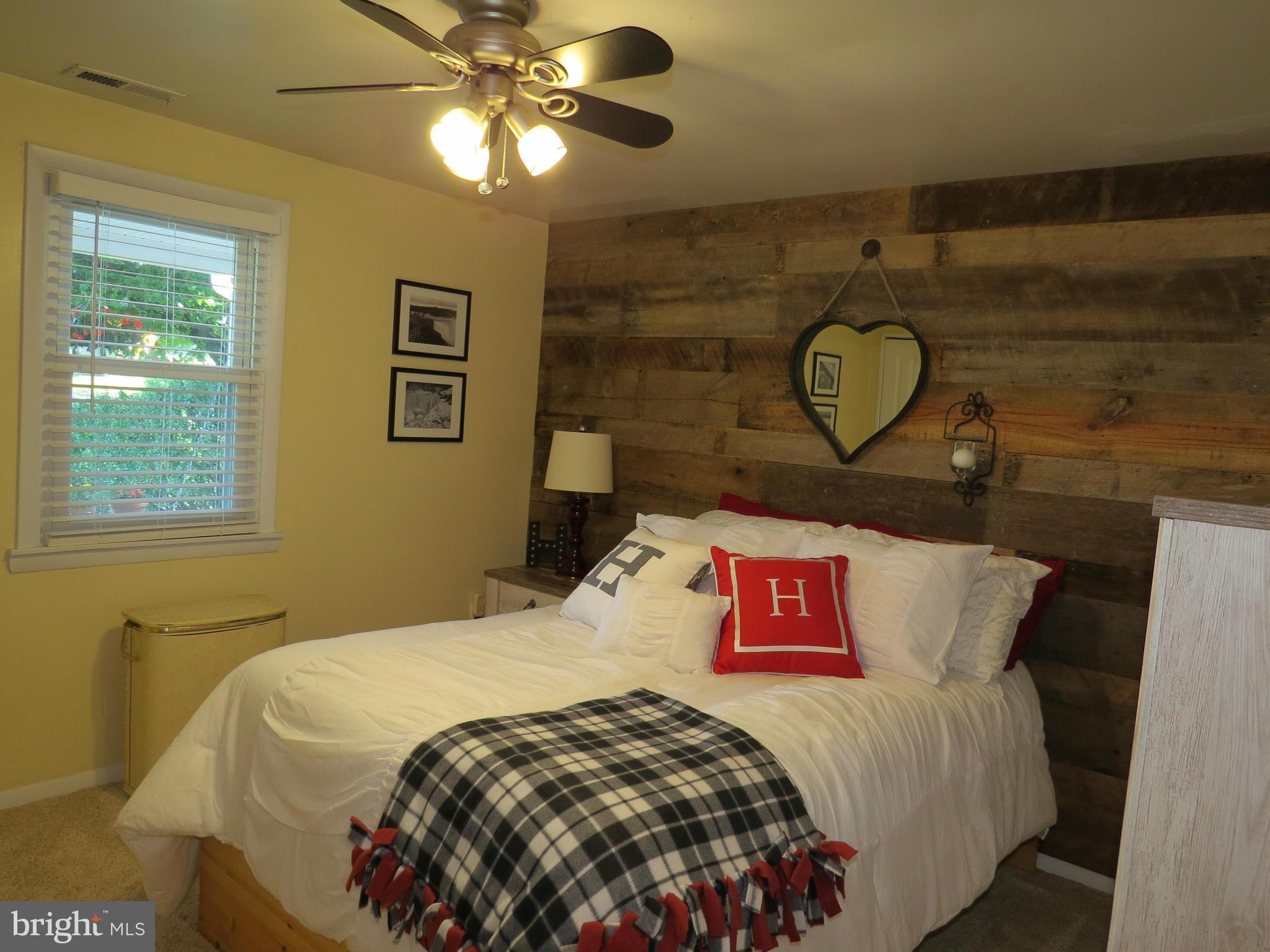 3313 Maple Grove Road Hampstead, MD 21074 - Photo 18 of 30 a bedroom with a bed and a window