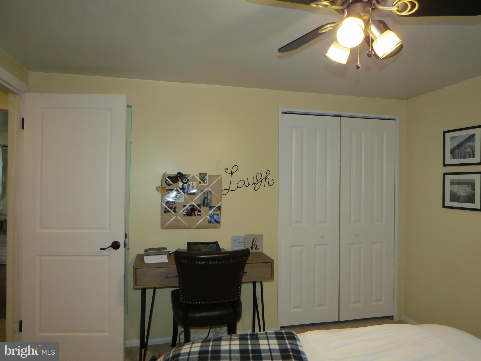 3313 Maple Grove Road Hampstead, MD 21074 - Photo 19 of 30 a workspace with furniture and a chandelier