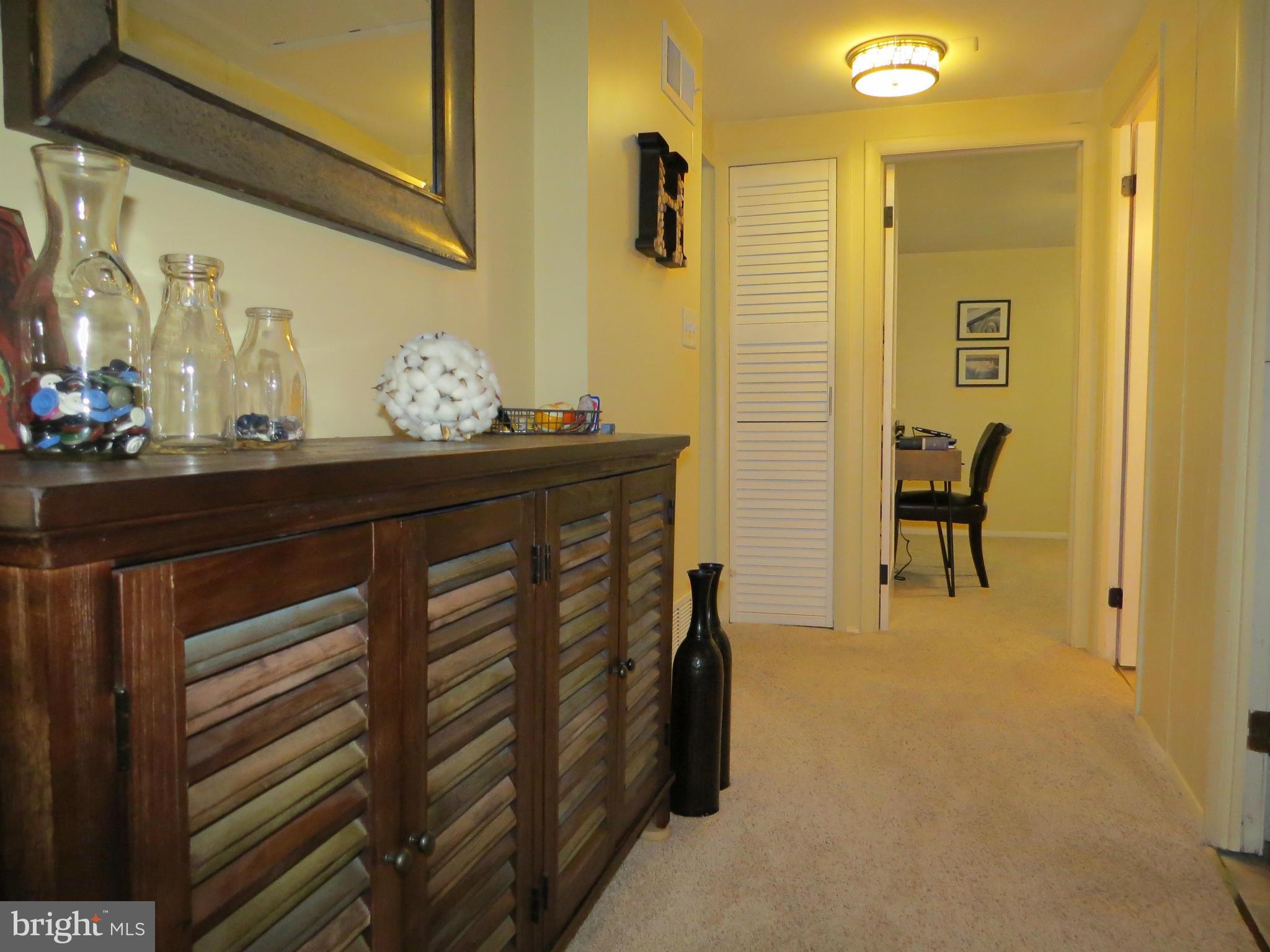 3313 Maple Grove Road Hampstead, MD 21074 - Photo 22 of 30 a bedroom with a bed and wooden floor