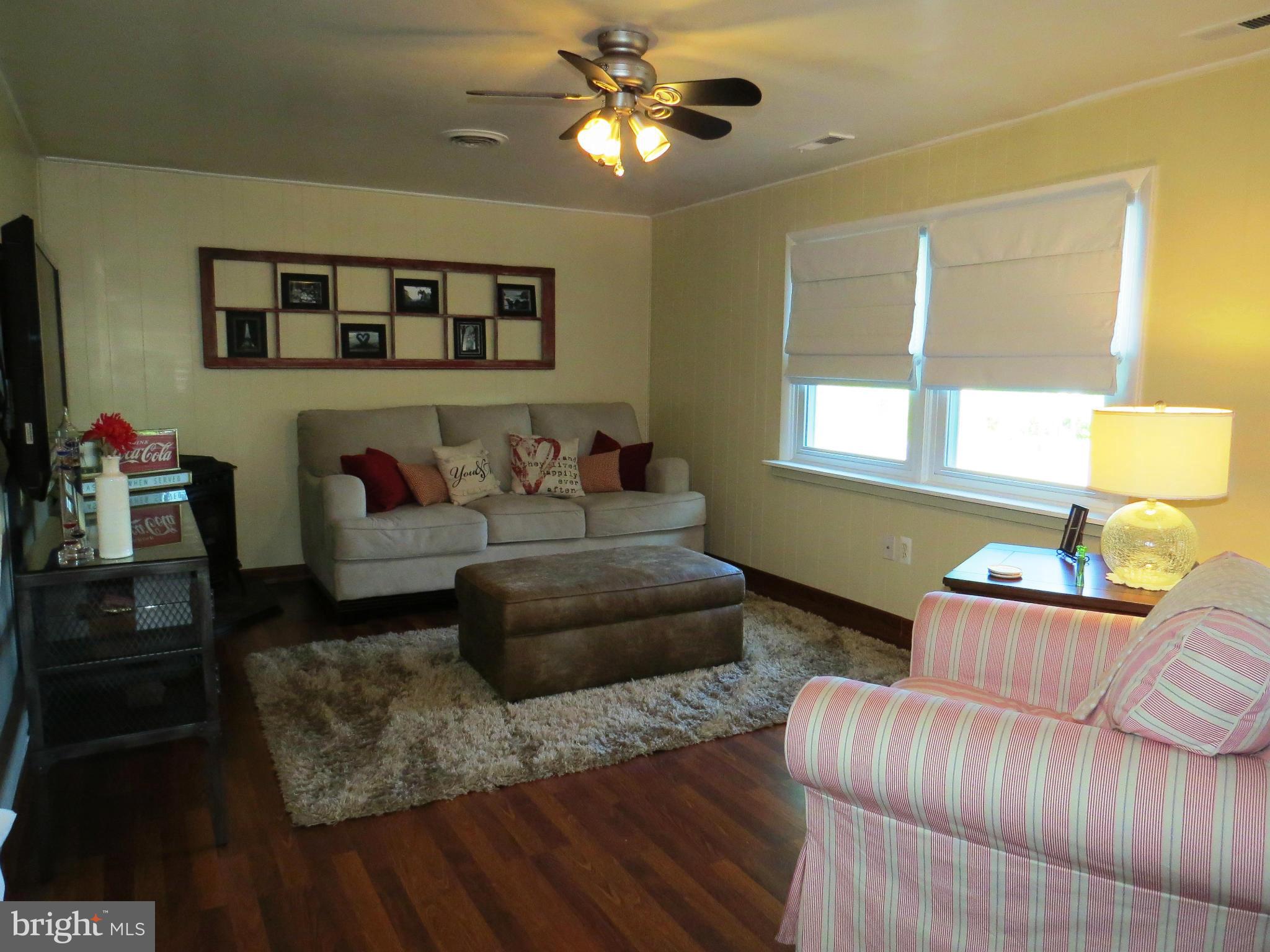 3313 Maple Grove Road Hampstead, MD 21074 - Photo 9 of 30 a living room with furniture and a window