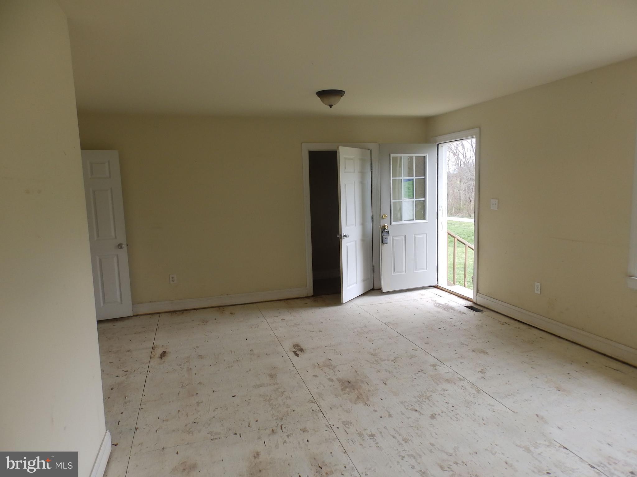 15125 Barnes Road New Windsor, MD 21776 - Photo 24 of 35 Living Room - View of Stairway to 2nd Floor