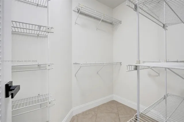 a view of a room with racks on the wall