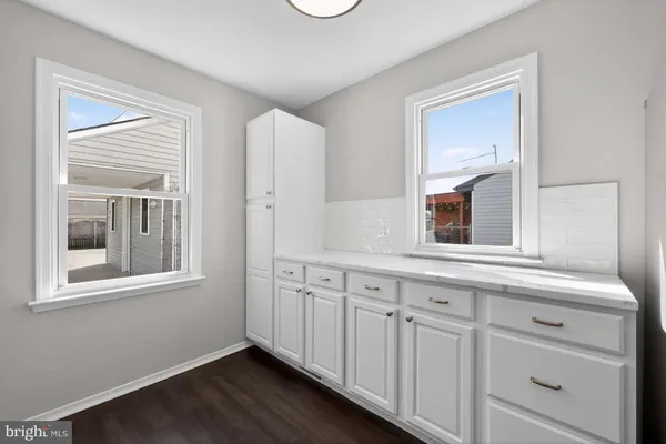 a view of a hallway with front door