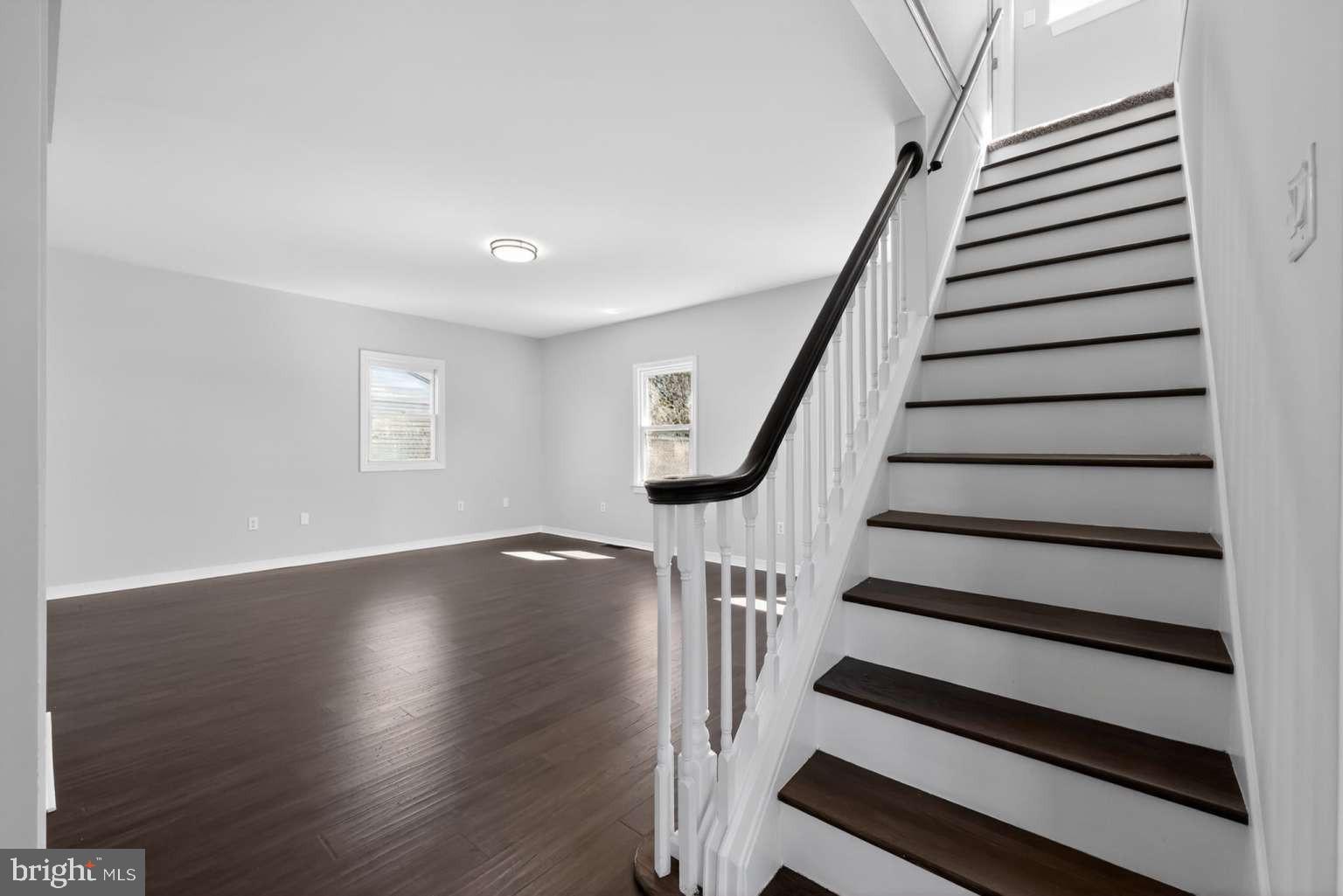 916 Stephen Avenue Croydon, PA 19021 - Photo 13 of 34 a view of entryway with wooden floor and stairs