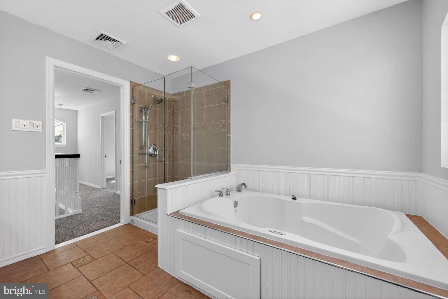 916 Stephen Avenue Croydon, PA 19021 - Photo 22 of 34 a bathroom with a bathtub and a shower