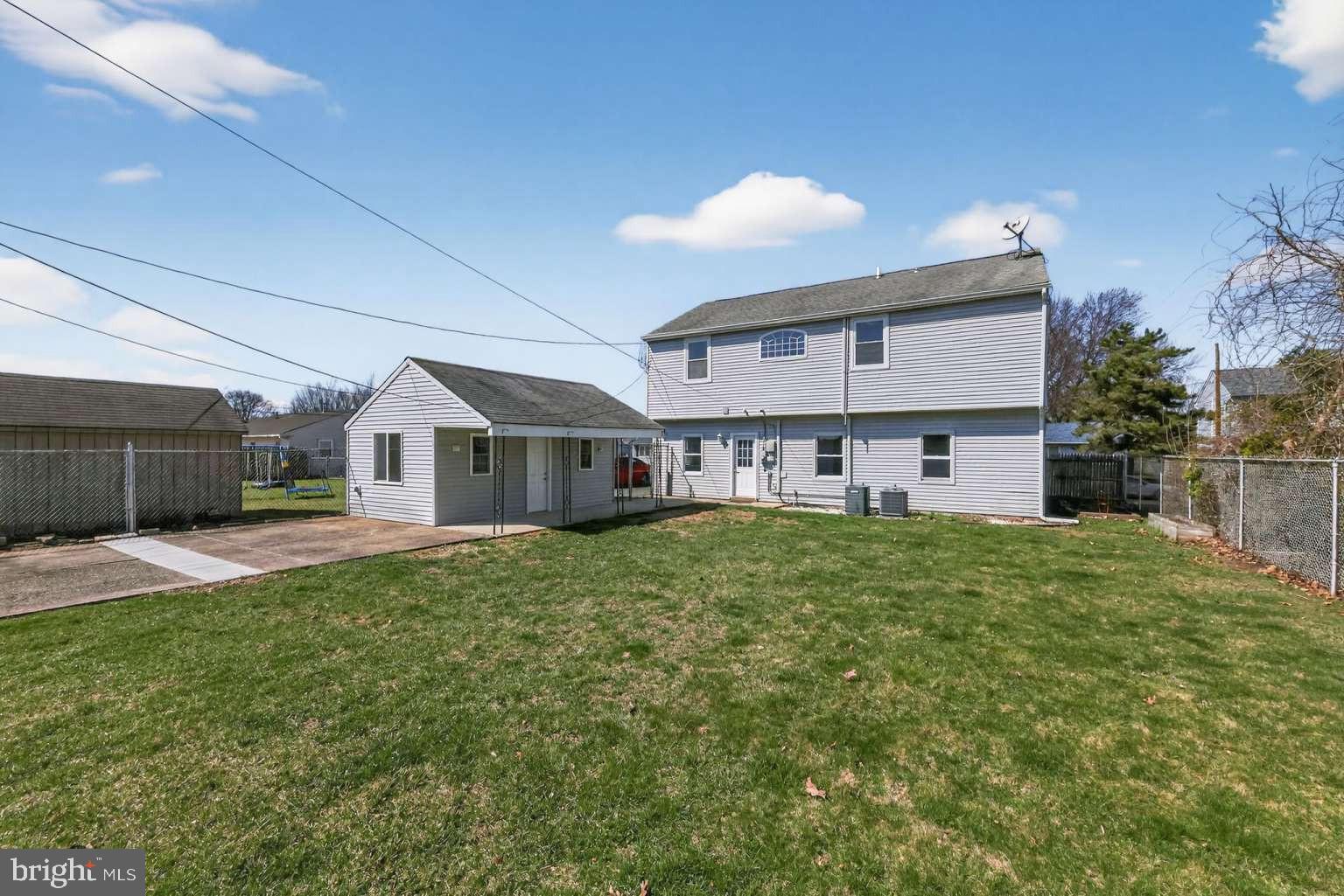 916 Stephen Avenue Croydon, PA 19021 - Photo 28 of 34 a front view of a house with a yard and porch