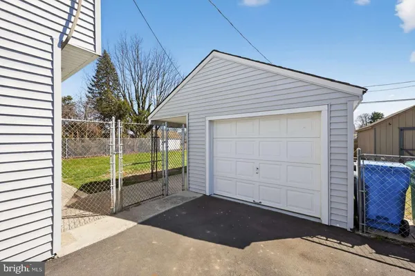 a view of a house with a backyard and balcony