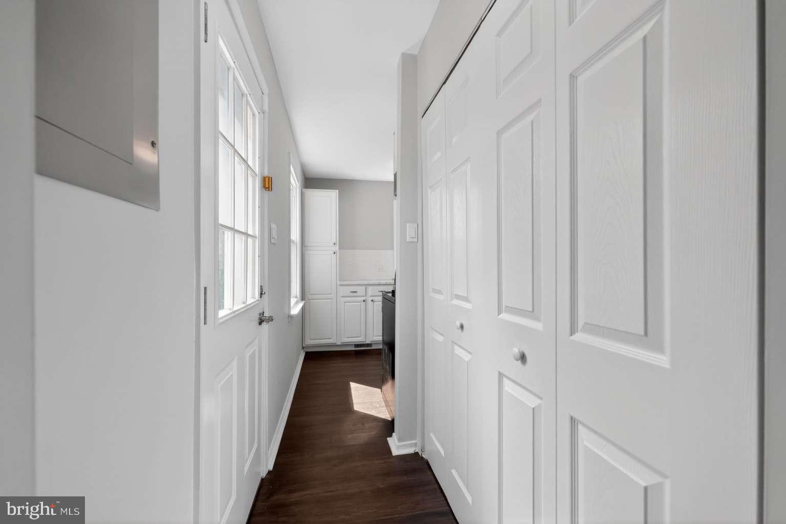 916 Stephen Avenue Croydon, PA 19021 - Photo 33 of 34 a view of a hallway with a wooden door