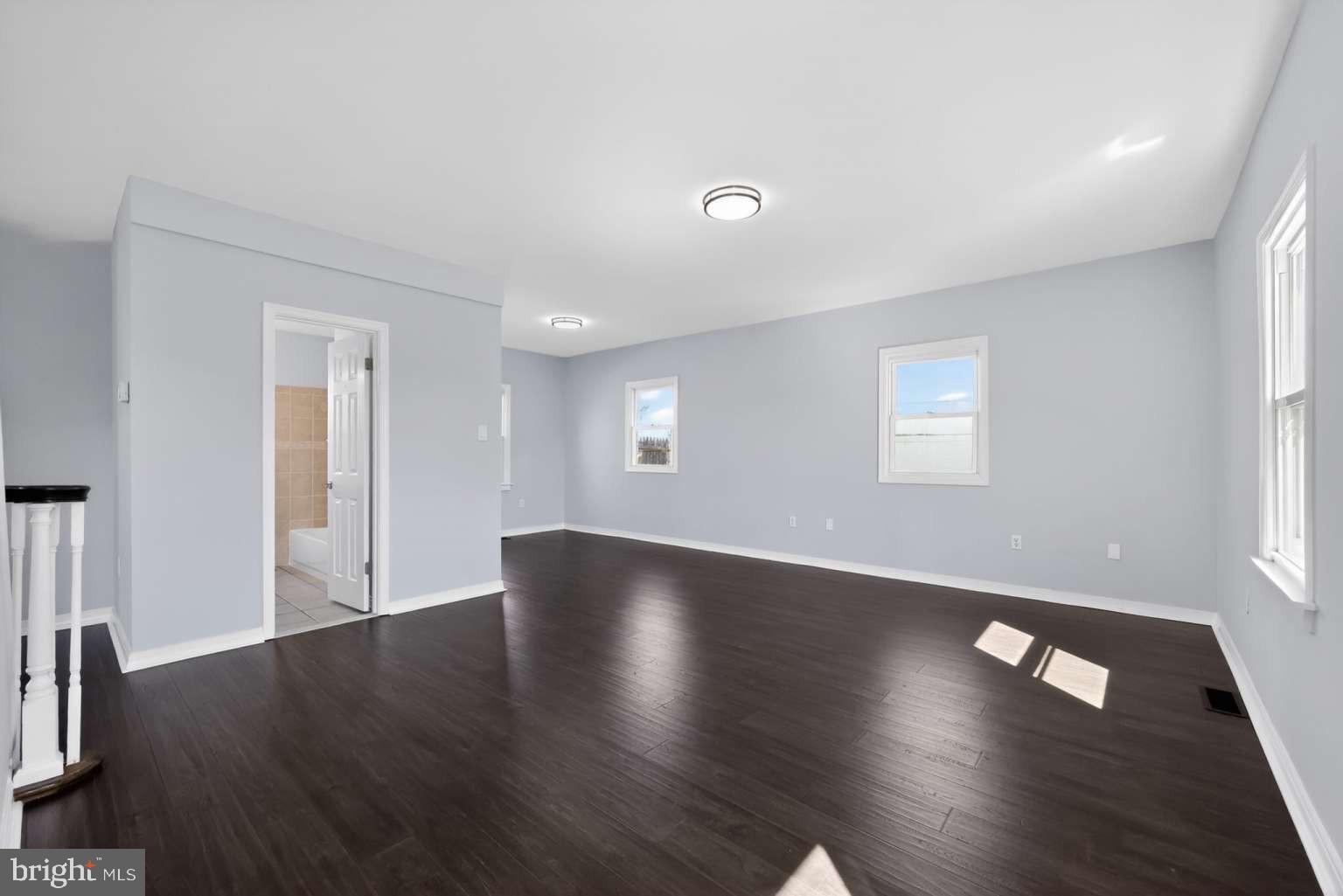 916 Stephen Avenue Croydon, PA 19021 - Photo 7 of 34 a view of a livingroom with wooden floor and window