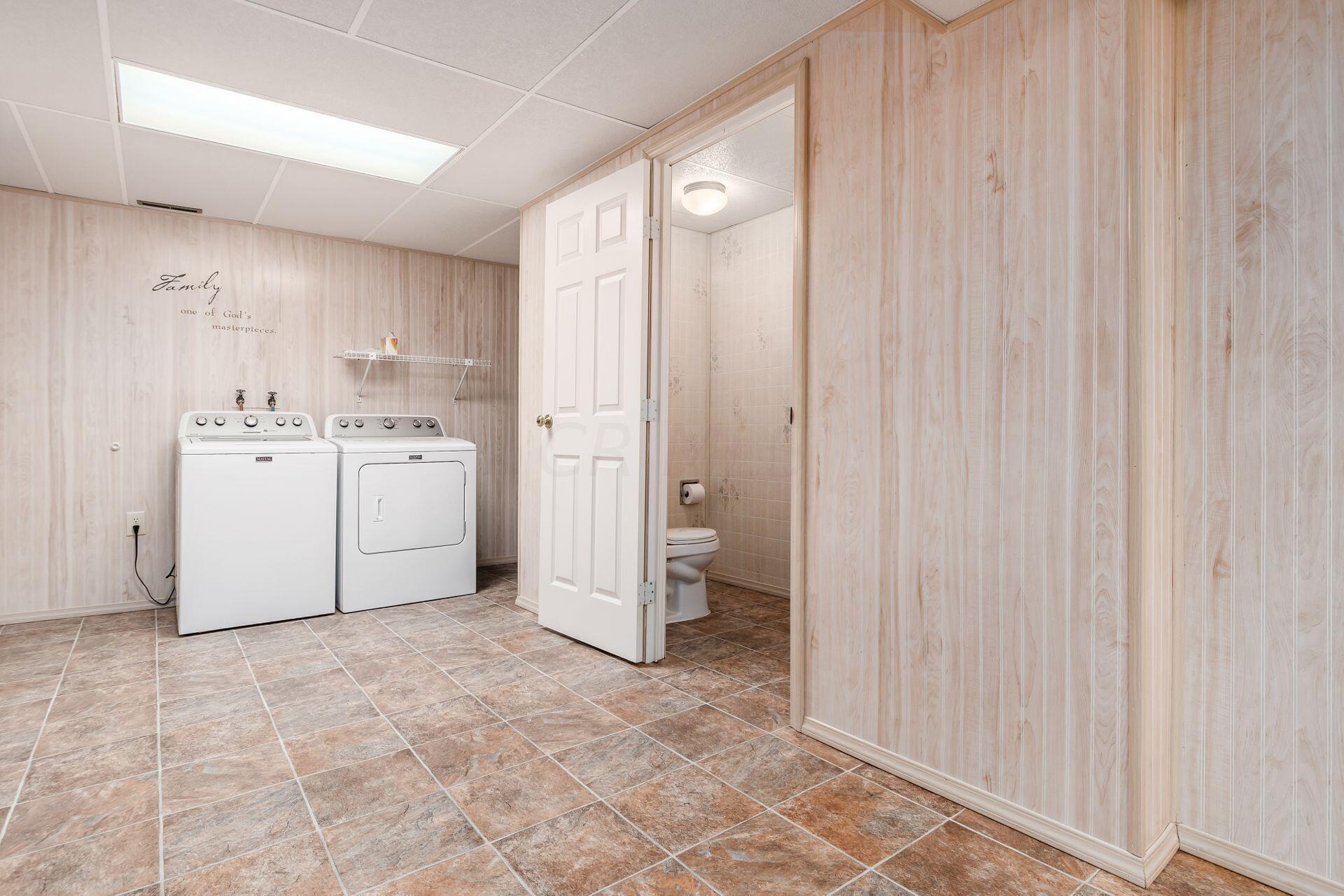 5400 Brook Road Northwest Lancaster, OH 43130 - Photo 18 of 44 Paneling and Vinyl Flooring w/View of Half Bath