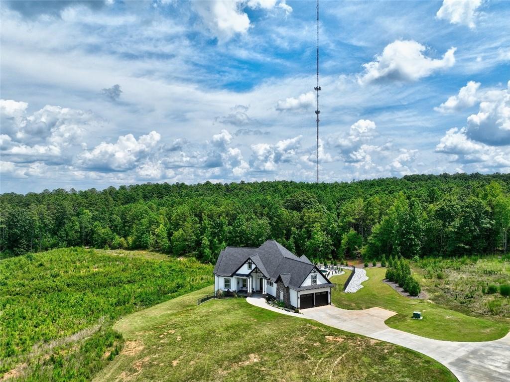 6620 Tyree Road Winston, GA 30187 - Photo 1 of 1 a view of a house with a big yard