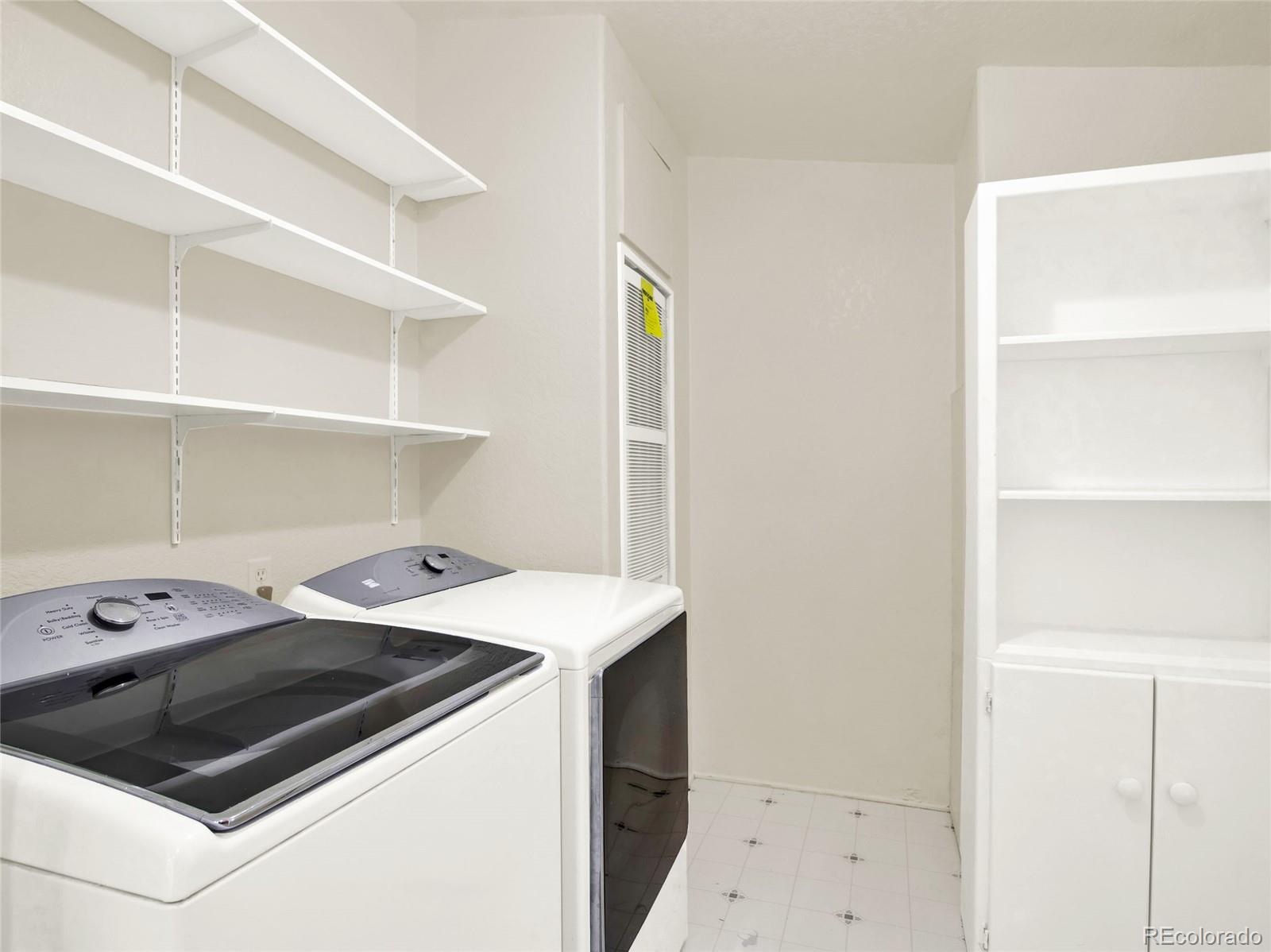 7798 Richard Avenue Fort Lupton, CO 80621 - Photo 15 of 45 a utility room with dryer and washer