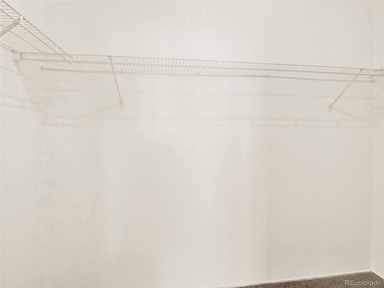 7798 Richard Avenue Fort Lupton, CO 80621 - Photo 19 of 45 a view of a rack on the wall