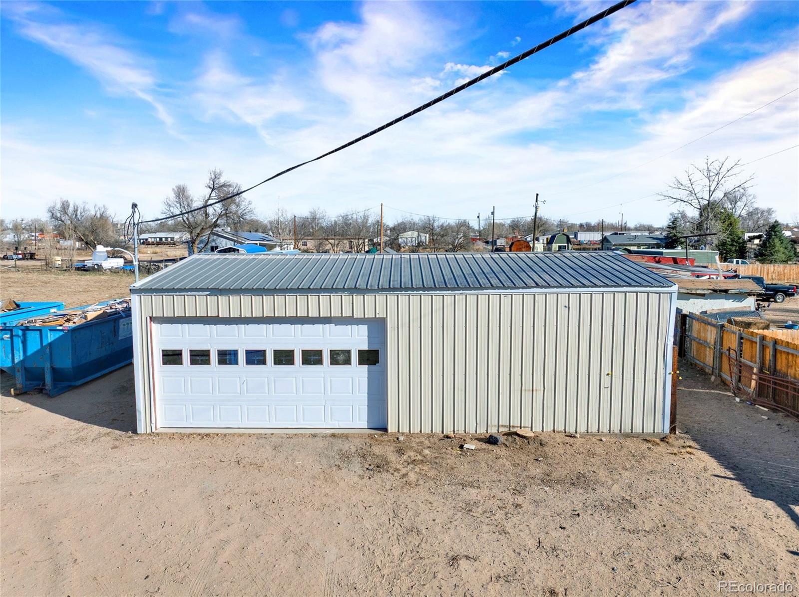 7798 Richard Avenue Fort Lupton, CO 80621 - Photo 28 of 45 a view of a house with a outdoor space