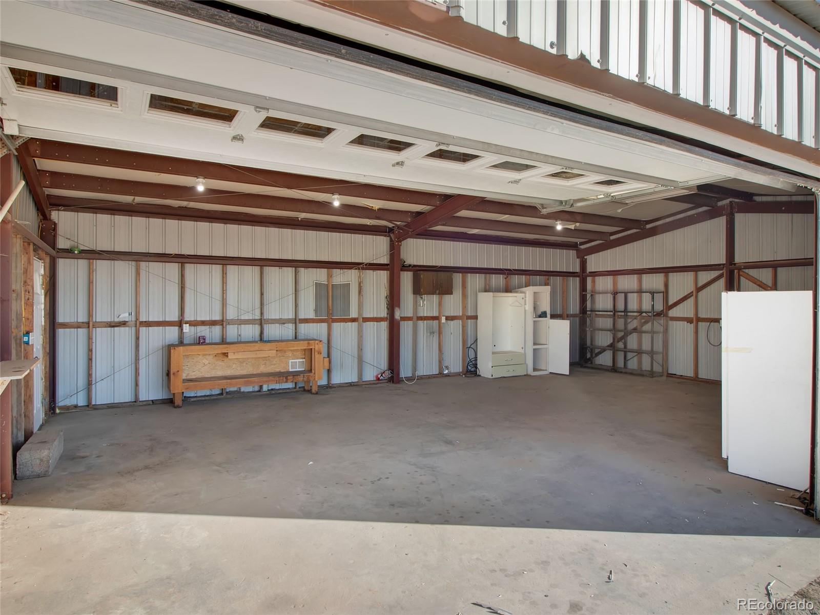 7798 Richard Avenue Fort Lupton, CO 80621 - Photo 29 of 45 a view of a garage