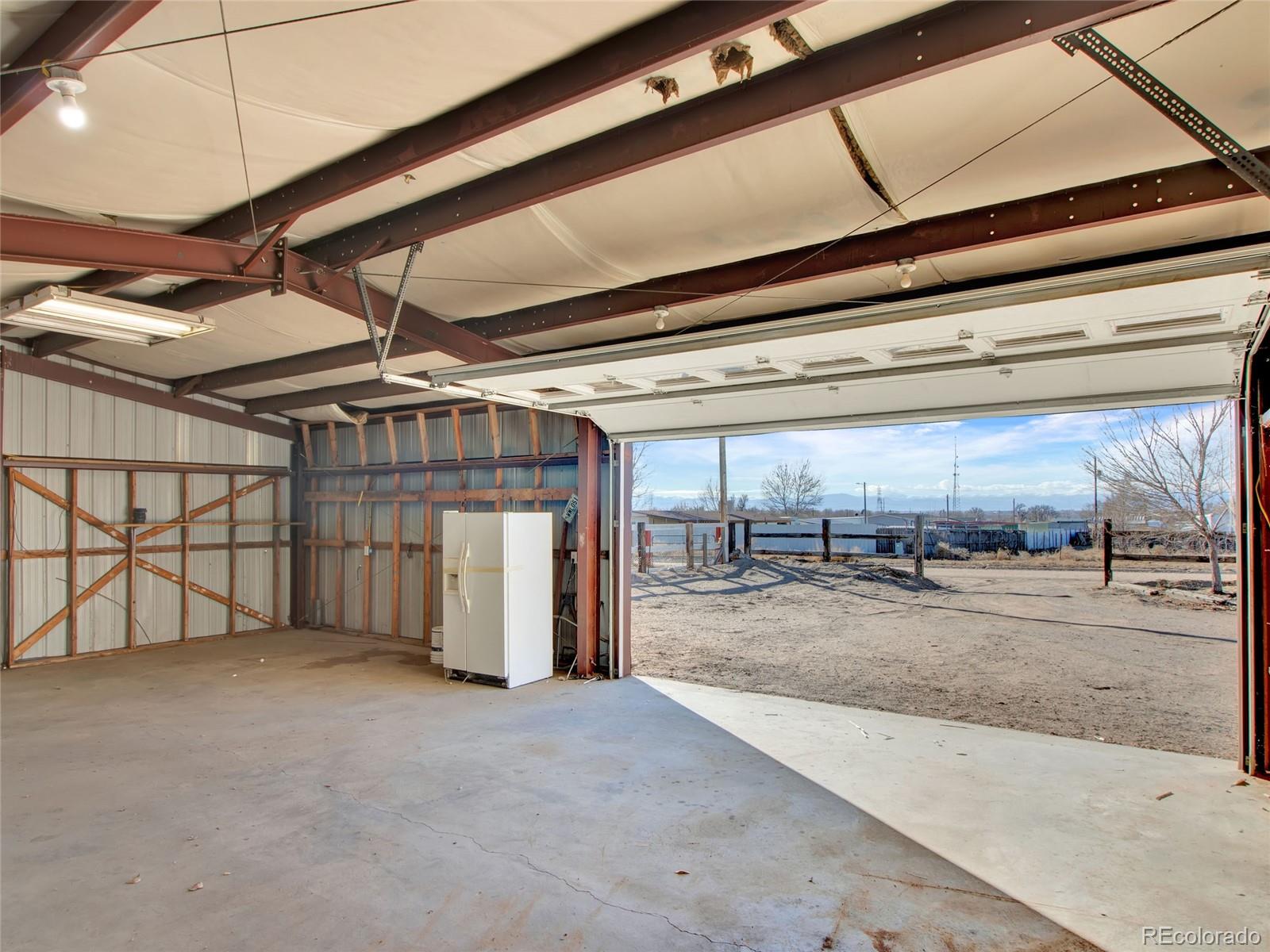 7798 Richard Avenue Fort Lupton, CO 80621 - Photo 31 of 45 a view of a garage