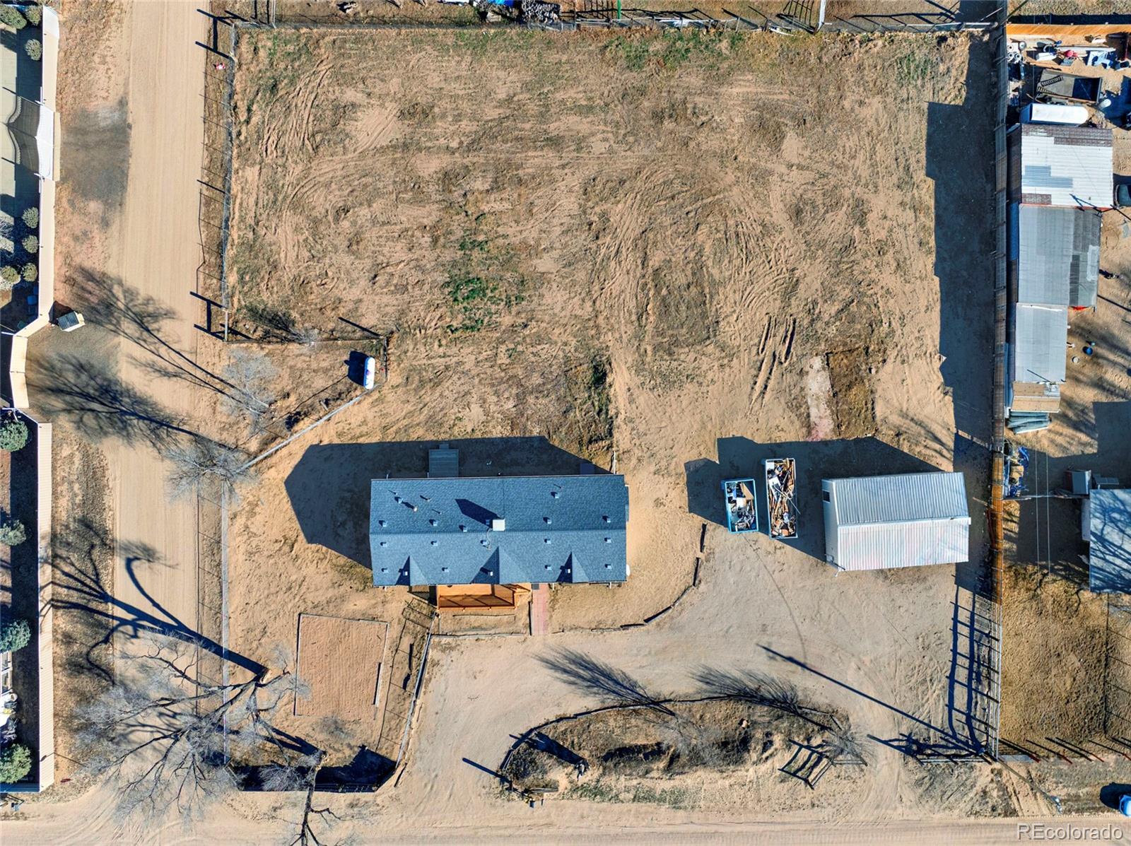 7798 Richard Avenue Fort Lupton, CO 80621 - Photo 38 of 45 a picture of a table and chairs in the patio