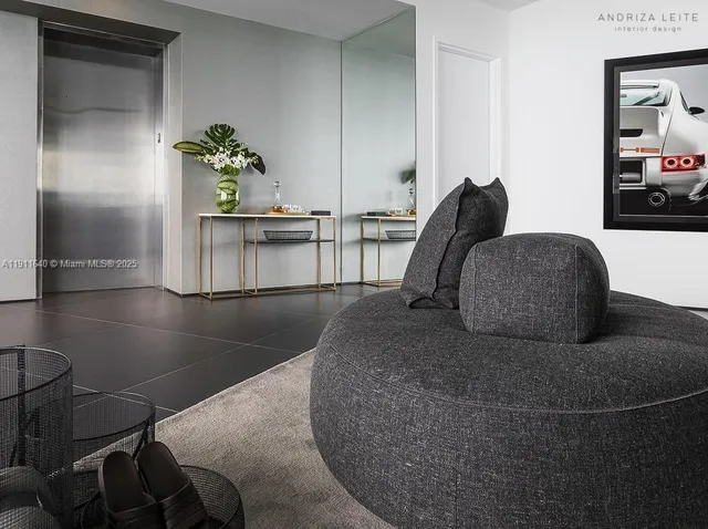a bathroom with a granite countertop sink a mirror and a shower
