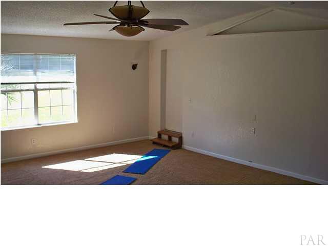 8230 Parker Road Milton, FL 32570 - Photo 8 of 15 Huge Ceiling Fan if family Rm