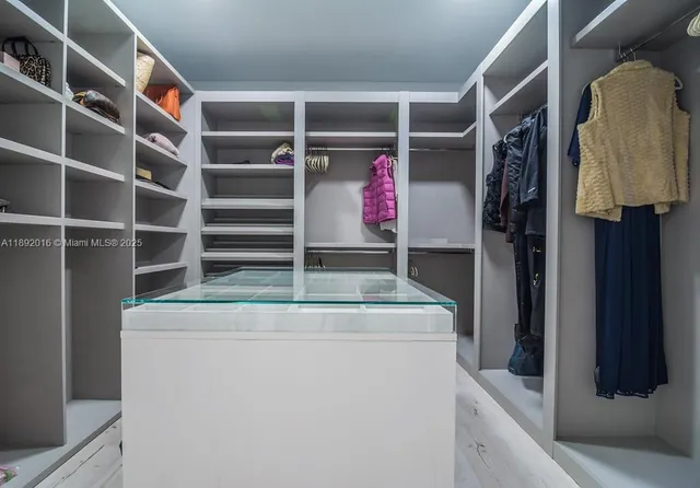 a view of a living room and entry way