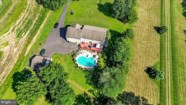 a front view of a house with a garden and porch