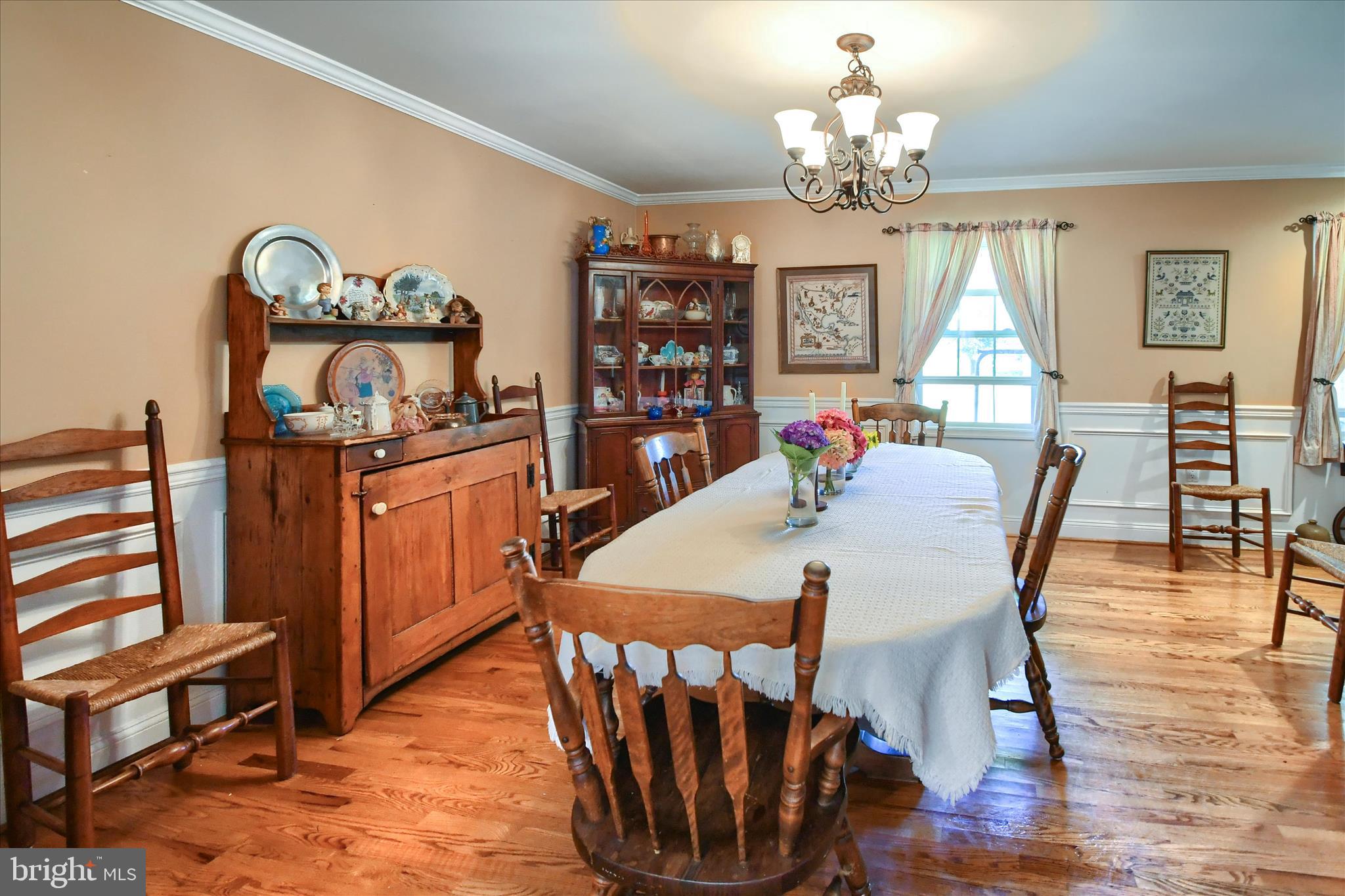 1010 Sweetbriar Road Perkasie, PA 18944 - Photo 12 of 59 a view of a dining room with furniture window and wooden floor
