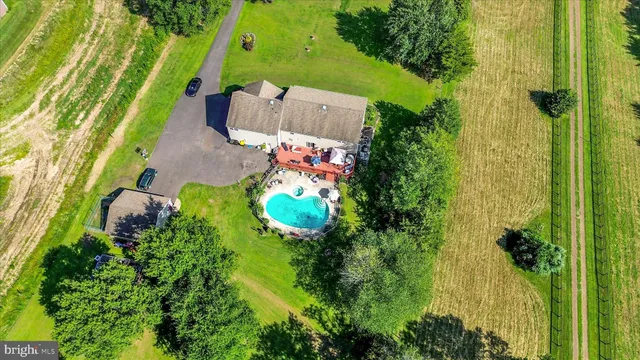 a view of a house with a big yard