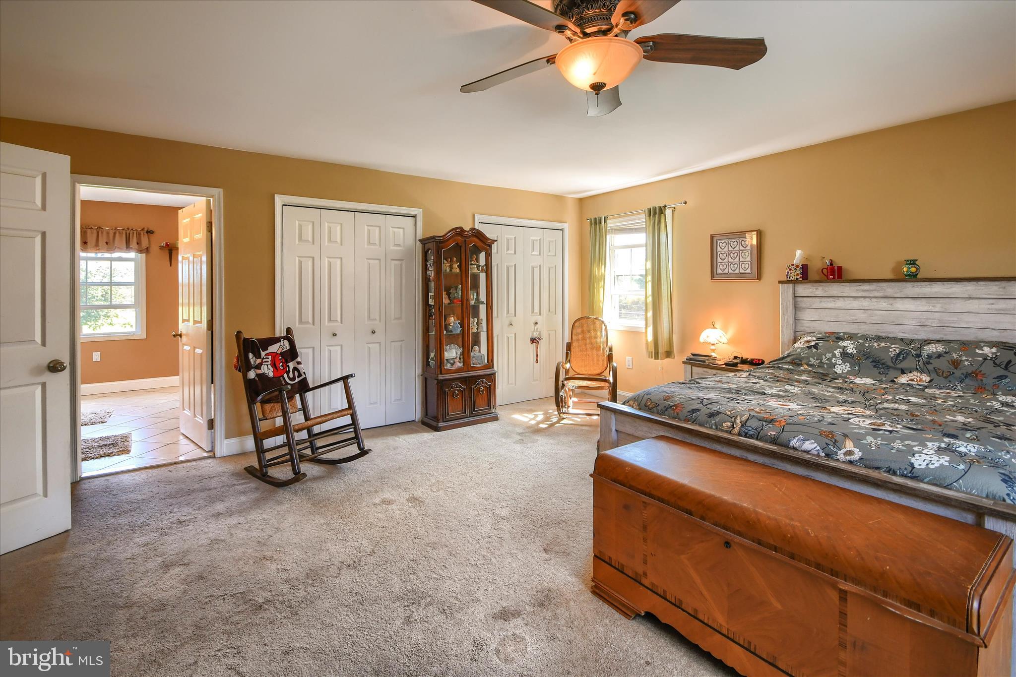 1010 Sweetbriar Road Perkasie, PA 18944 - Photo 22 of 59 a view of a livingroom with furniture and a ceiling fan