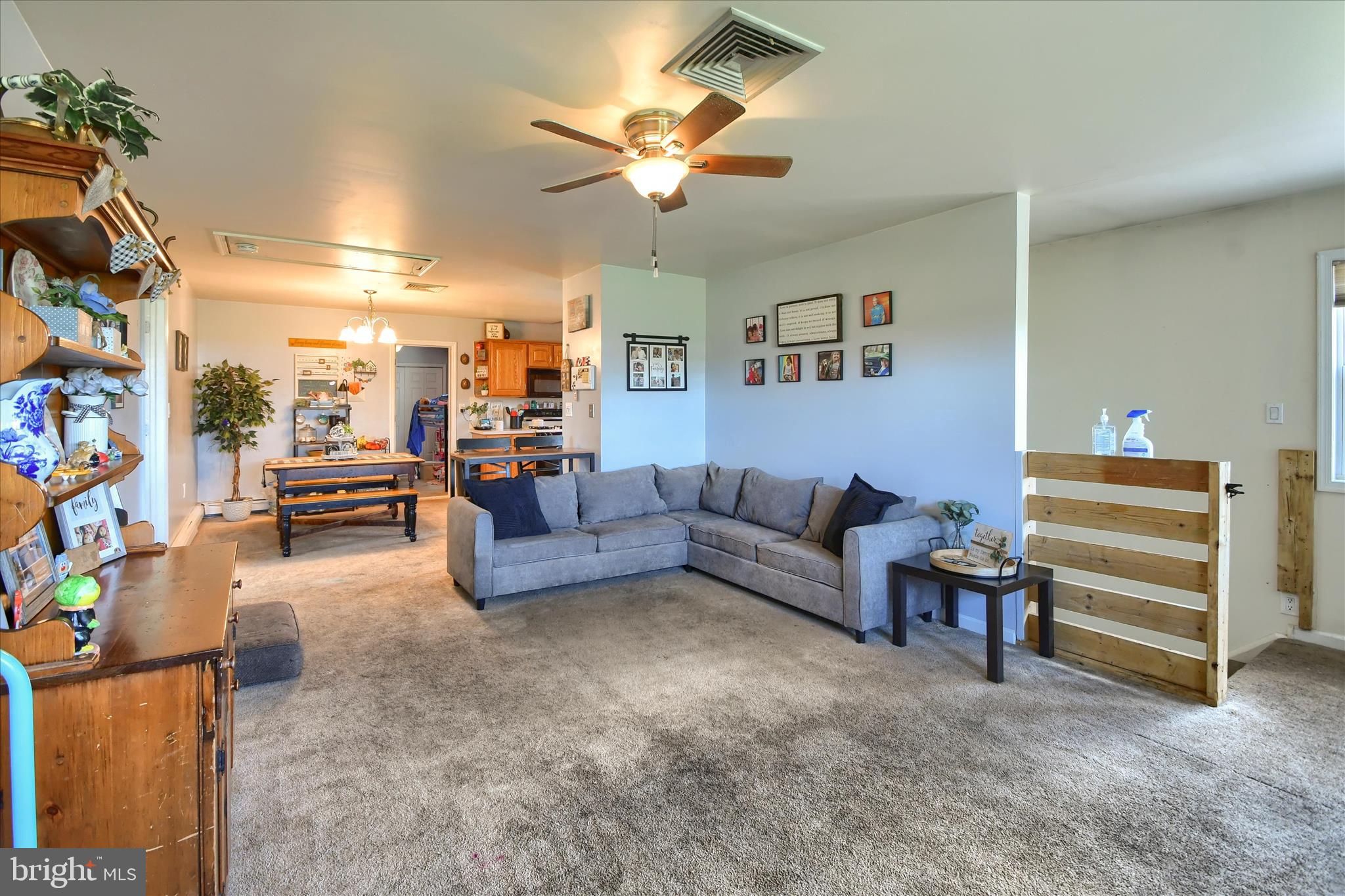 1010 Sweetbriar Road Perkasie, PA 18944 - Photo 28 of 59 a living room with furniture and a ceiling fan